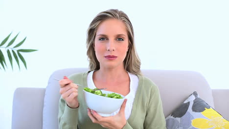 woman eating a healthy salad