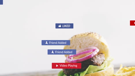 burger with onion and lettuce overlaid with social media notification animations