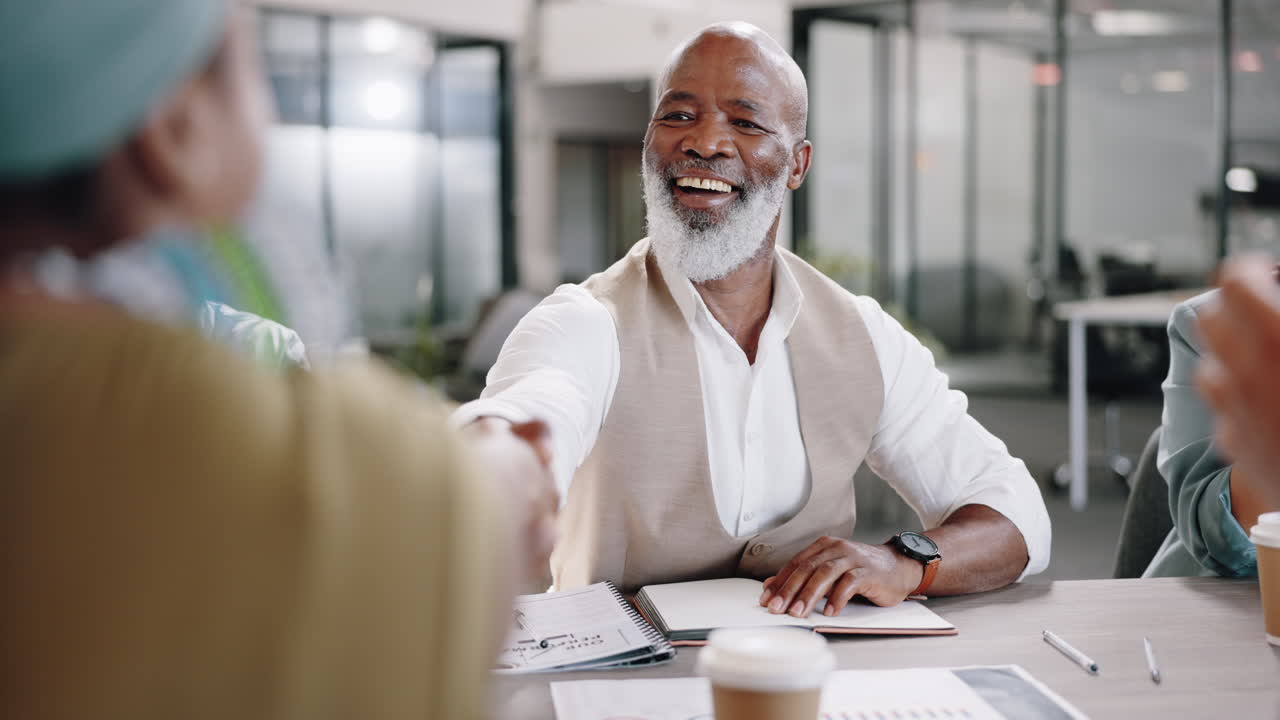 Senior black man, handshake