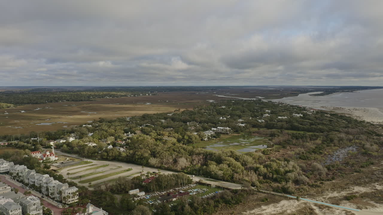 st simons georgia aerial v1 dolly out shot of waterside neighborhood and coastline - march 2020