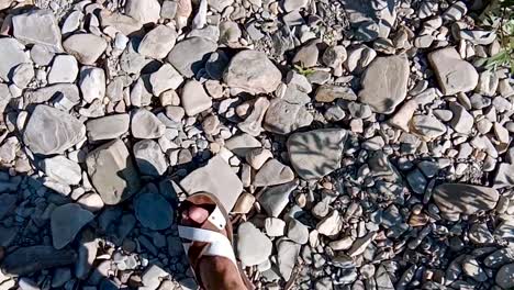 walking on a rocky riverbed