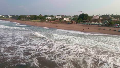 high waves perfect for surfing at beautiful berawa beach in canggu, bali indonesia