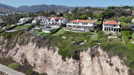 exquisite estate mansions on cliff edge above malibu, california