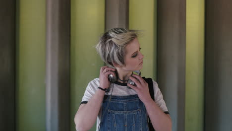 portrait of young woman student alternative grunge headphones