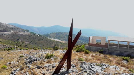 Drone-shot-of-an-iron-monument-in-Andalusia,-Spain