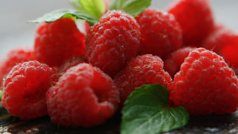 Ripe-appetizing-raspberry-with-leaves-