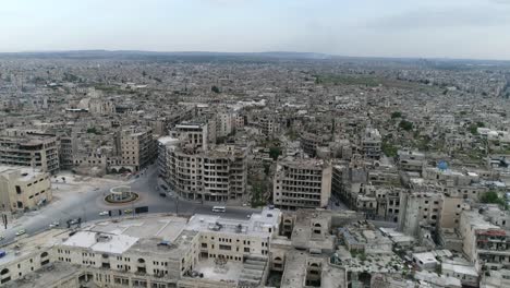 aleppo in syria 10 years after the civil war. we can see busy streets in the city, with cars and people  in aerial view 4k