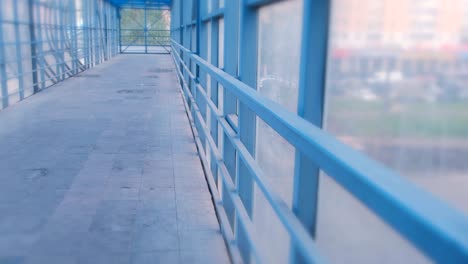 elevated pedestrian crossing from the inside. safe passage across the road.