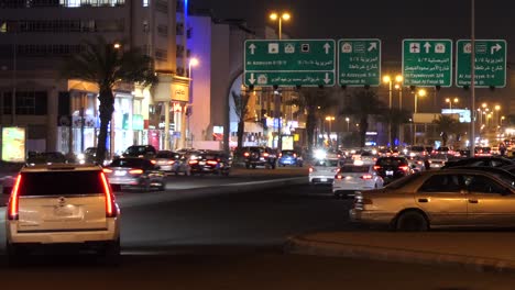 busy traffic at prince mohammed bin abdulaziz street (tahlia street) at night