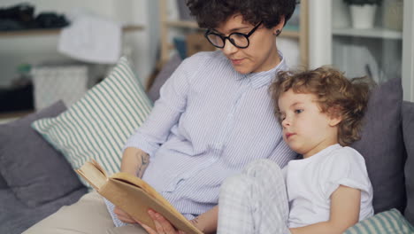 mother and son reading together