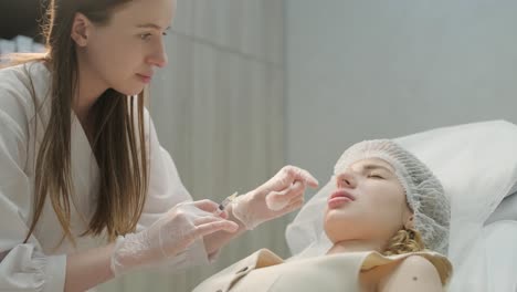 close-up of cosmetologist performing facial injection