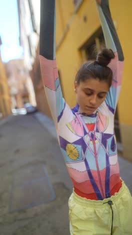 stylish woman posing in a colorful outfit