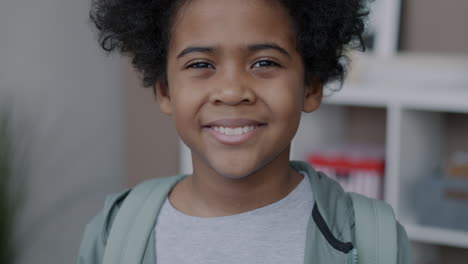 smiling girl with backpack
