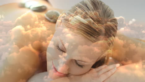 blonde women enjoy a hot stone spa treatment for valentine's day in a 4k cloudscape setting.