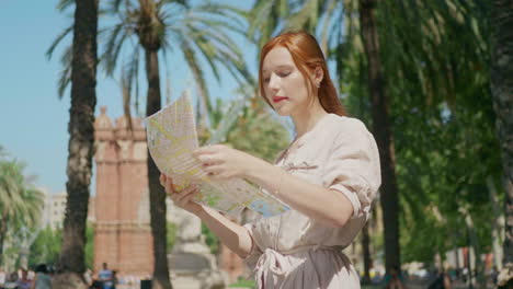 closeup tourist woman looking map outdoor. female tourist searching direction