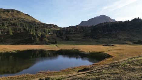 deserted place clashed with green nature adventurous exploration oaza water resort place in the middle of nowhere natural occurring reflections in the liquid different colour shades great mountain sky