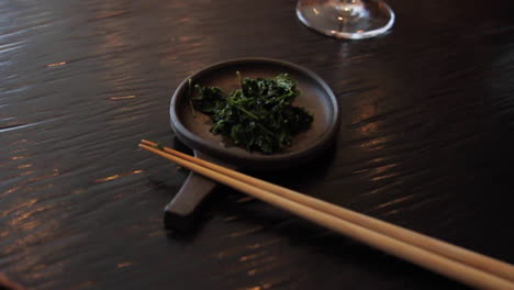 Seaweed-being-eaten-during-Japanese-Tea-Ceremony-in-Tokyo-Japan