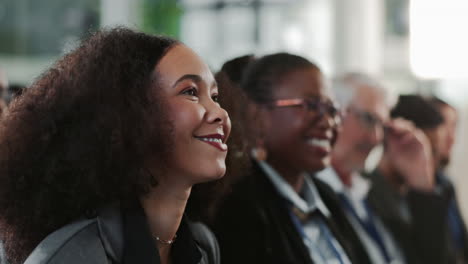 a group of diverse people attend a business meeting or conference.
