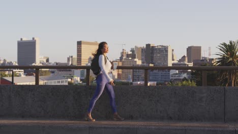 mixed race woman walking on the street