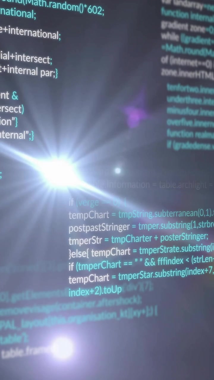 Animation of moving lens flares and multicolored computer language against black background