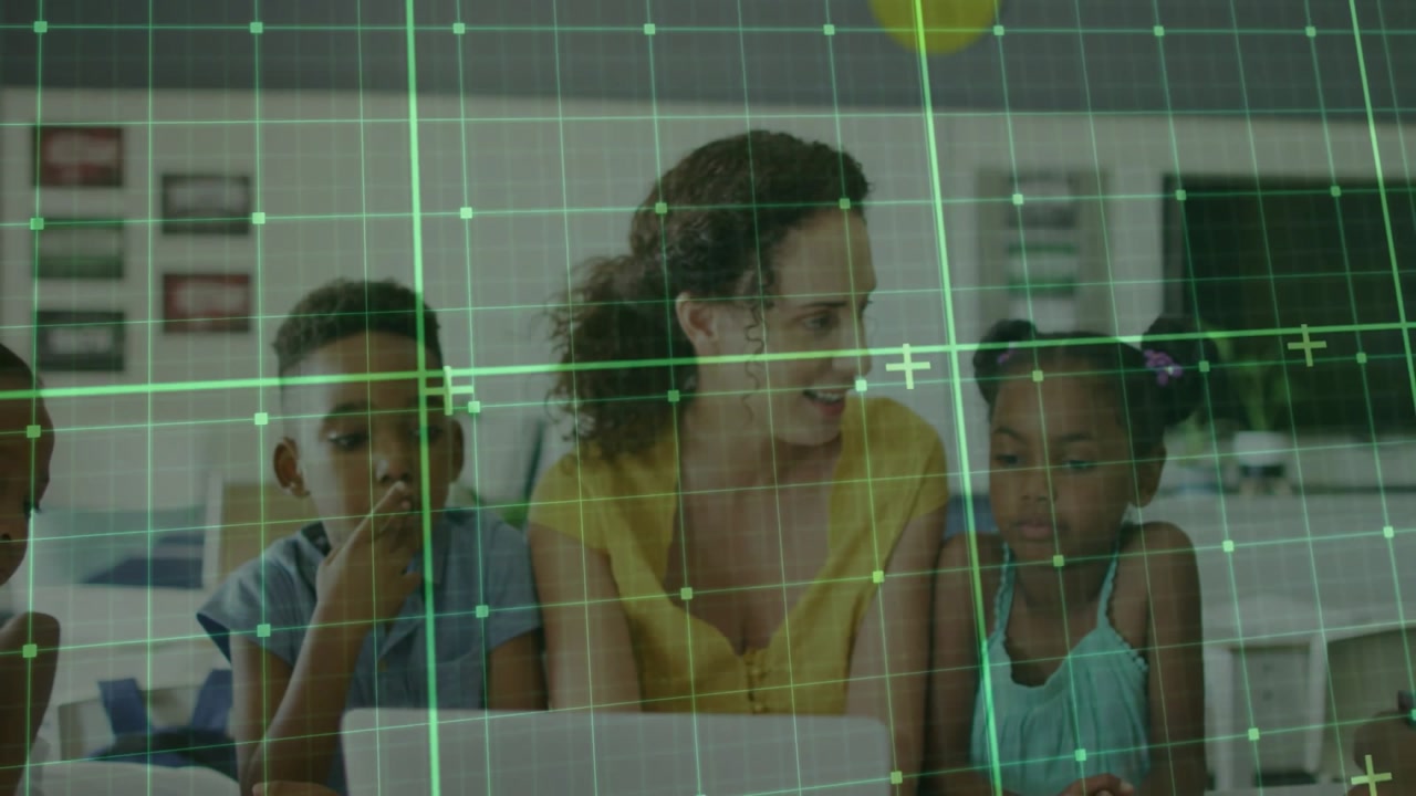 Educator tapping laptop and speaking initiating green grid overlay guiding classroom learning