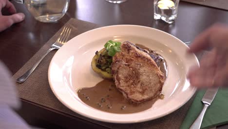 serving plate with meat meal in luxury international cuisine restaurant, close up