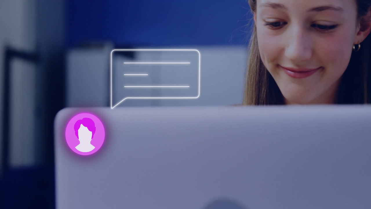 Using laptop with animation of chat bubble and profile icon overlay