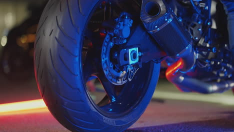 close-up of a motorcycle rear end at night