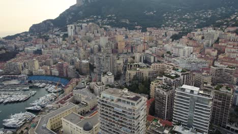 Monaco-Buildings-and-Skyscrapers-at-Sunset,-Breathtaking-Aerial-Landscape