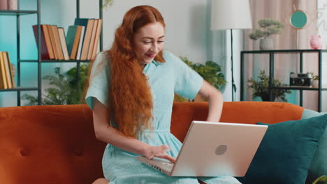 amazed young woman use laptop computer, receive good news message, shocked by victory, celebrate win