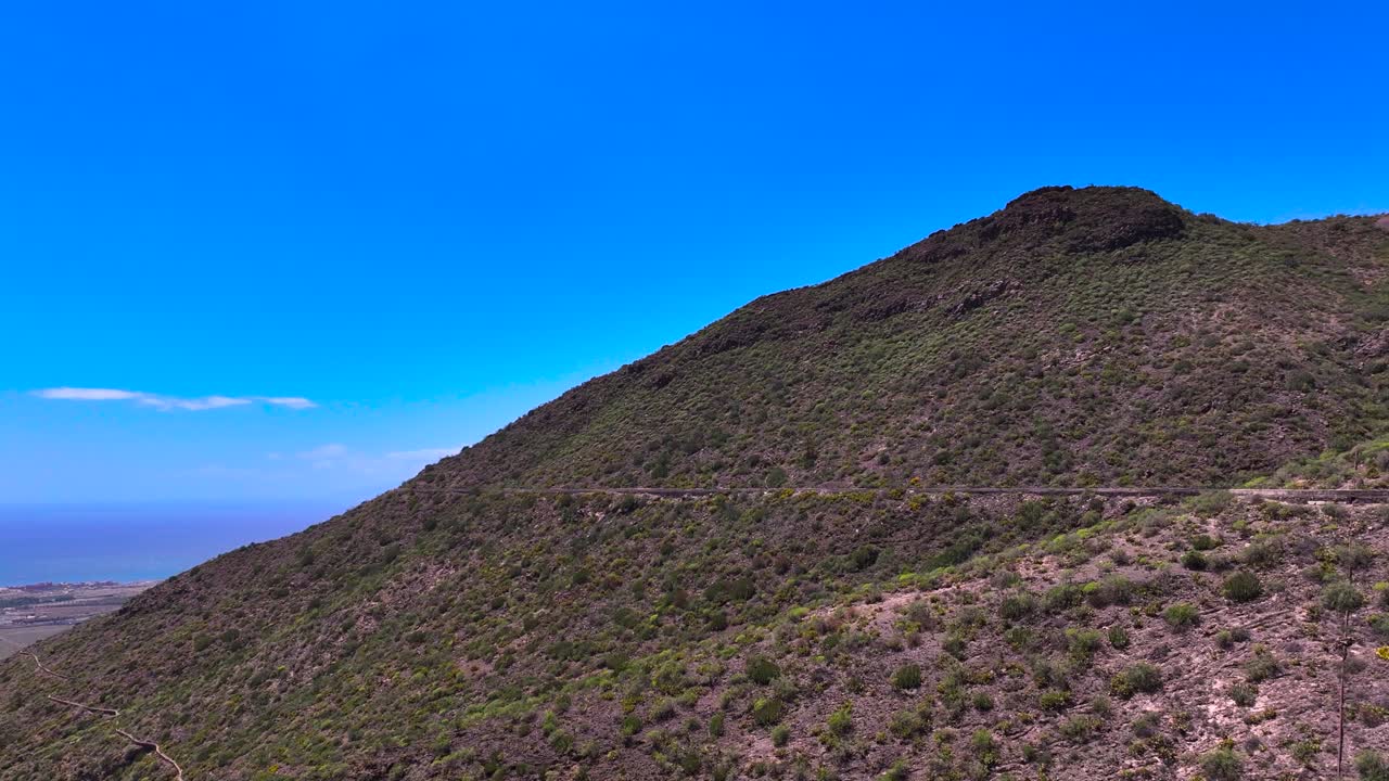 Volcanic mountain view with irrigation ditches in Adeje, Tenerife, Canary Islands