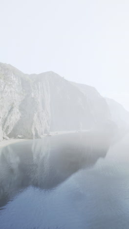 foggy ocean coast with cliffs