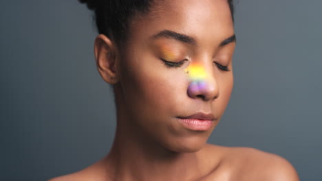 woman with rainbow makeup