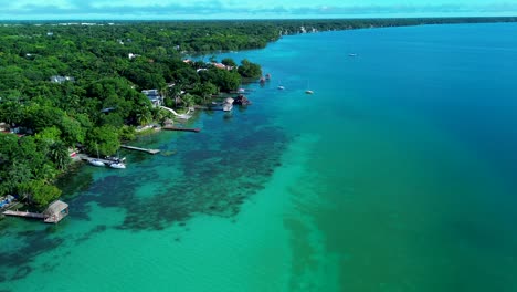 aerial view of a tropical coastline with turquoise water