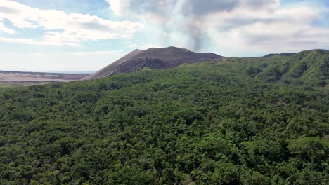 Aerial-drone-holiday-trip-smoke-sky-volcano-over-rainforest-travel-tourism-Tanna-Island-Pacific-Islands-Vanuatu-4K