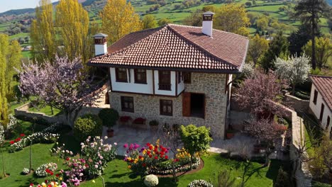 traditional stone house in a beautiful garden