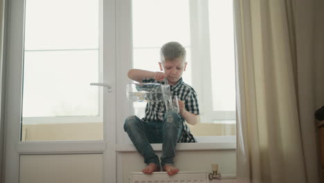 boy pouring water