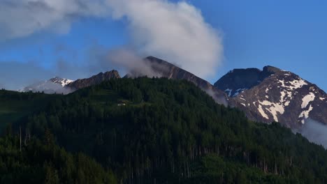 Panoramic-mist-and-snow-covered-mountain-landscape-scene