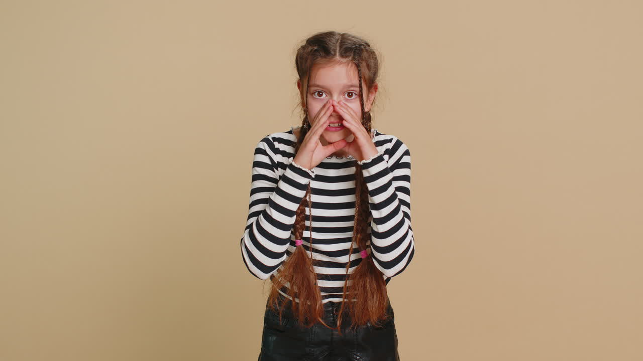 Child girl kid whisper news rumors holding hands near mouth share gossip quiet keep my secrets