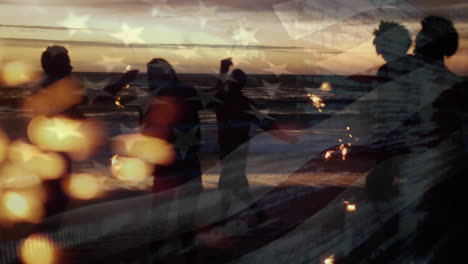 Animation-of-waving-flag-of-usa-over-group-of-friend-having-fun-on-the-beach