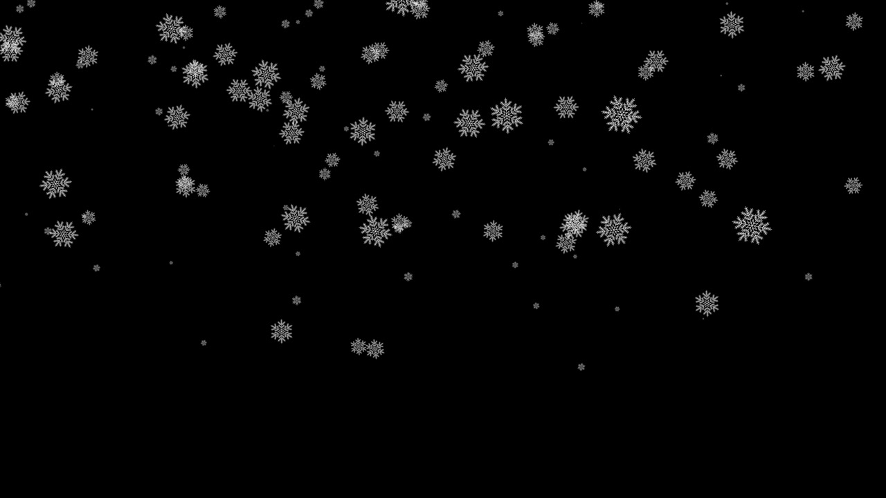 White Snowflakes Falling Against a Black Background