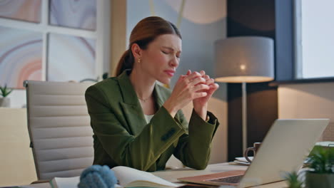 Nervous employee gesturing hands in office closeup. Businesswoman feeling sad