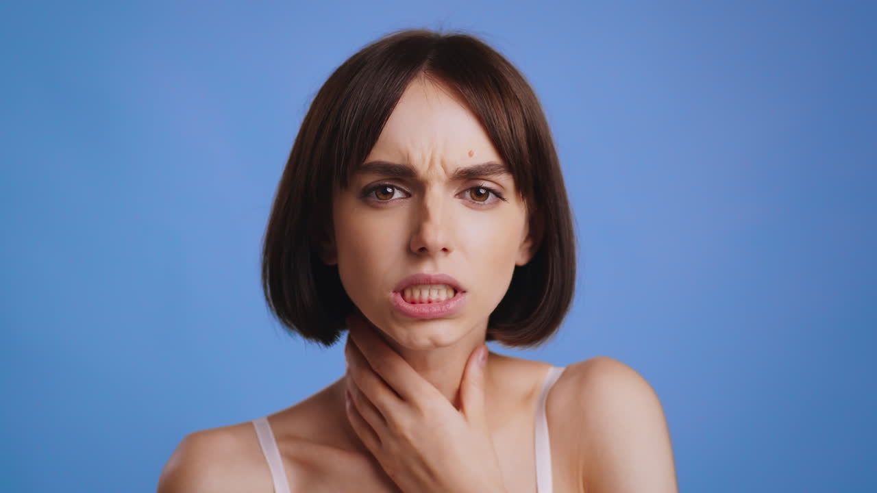 Woman with Sore Throat