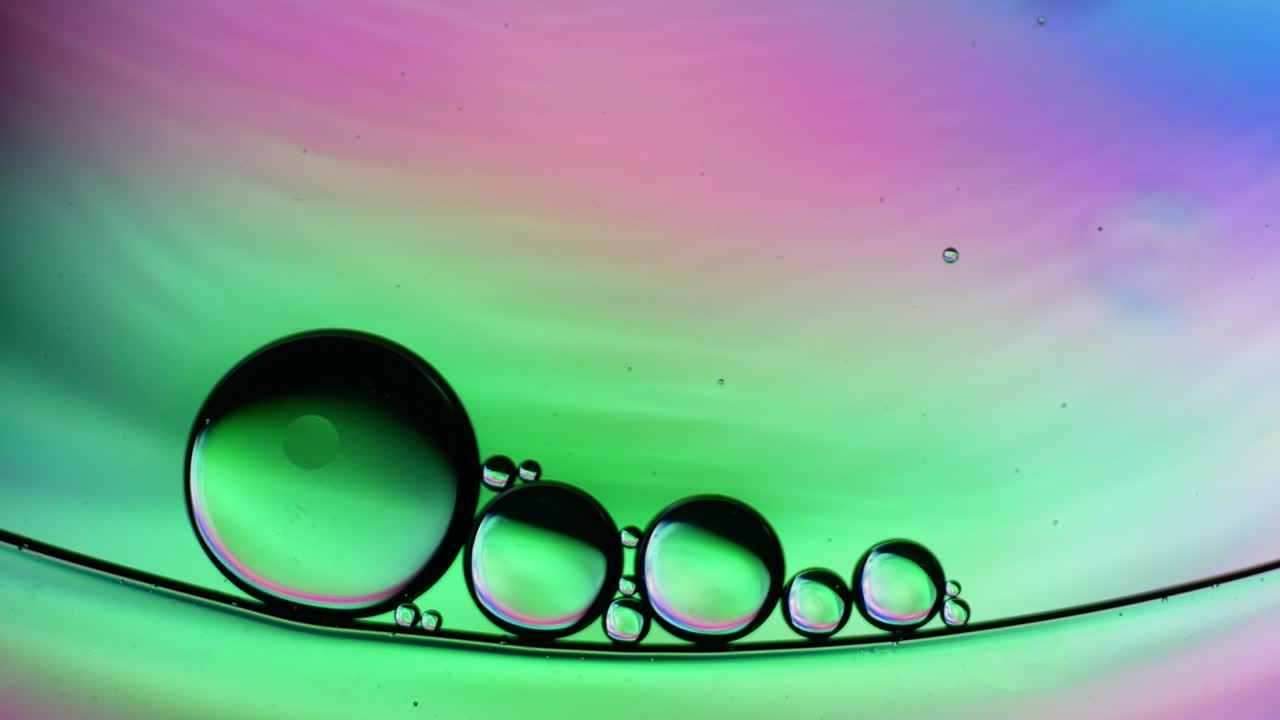 colorido artístico de gota de aceite flotando en el agua. fondo de burbuja abstracta