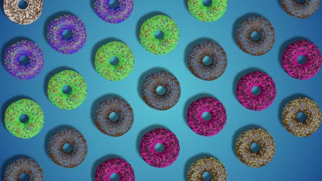 tasty colorful glazed and sprinkled donuts appears and disappears on blue abstract background