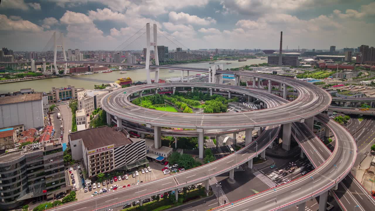 day light traffic round interchange panorama 4k time lapse from shanghai