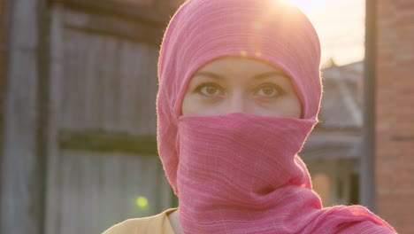 woman in a pink hijab