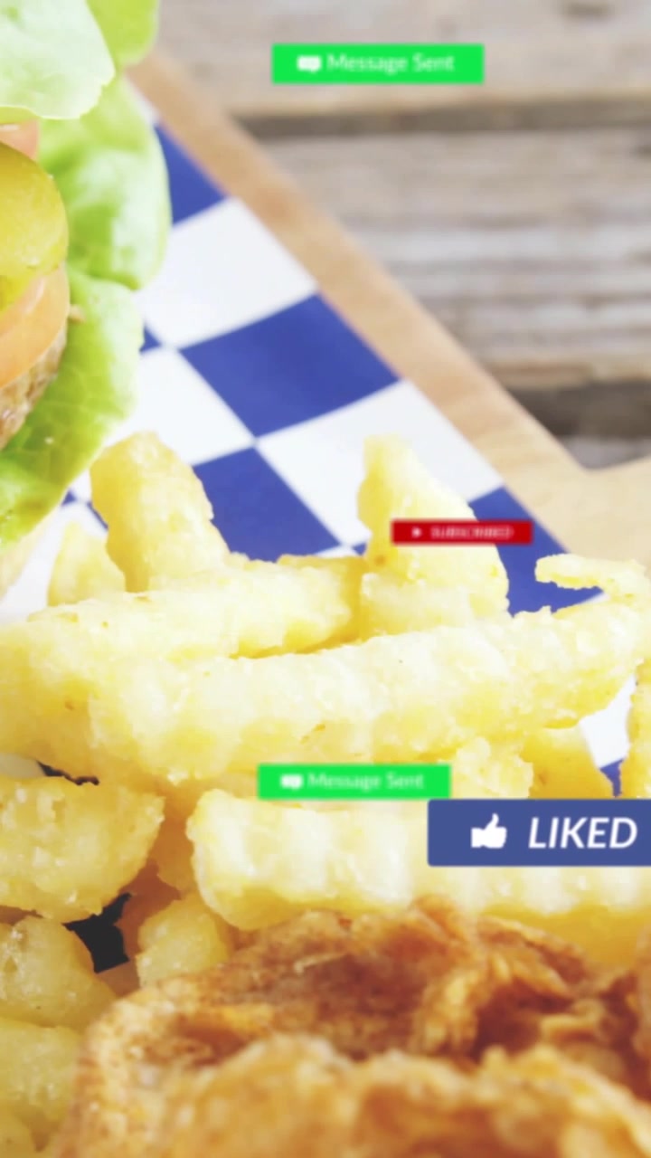 Vertical video: Changing LIKE badge cam zooming revealing rings and burger badges popping for likes