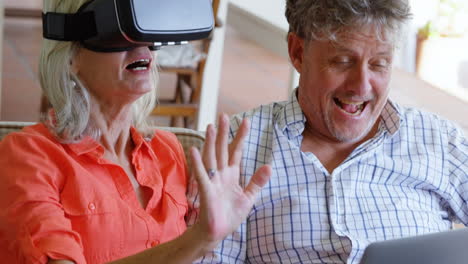 blue icon with senior woman wearing vr headset