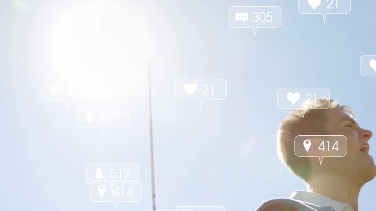 Animation of social media notifications overlaying scene with person outdoors